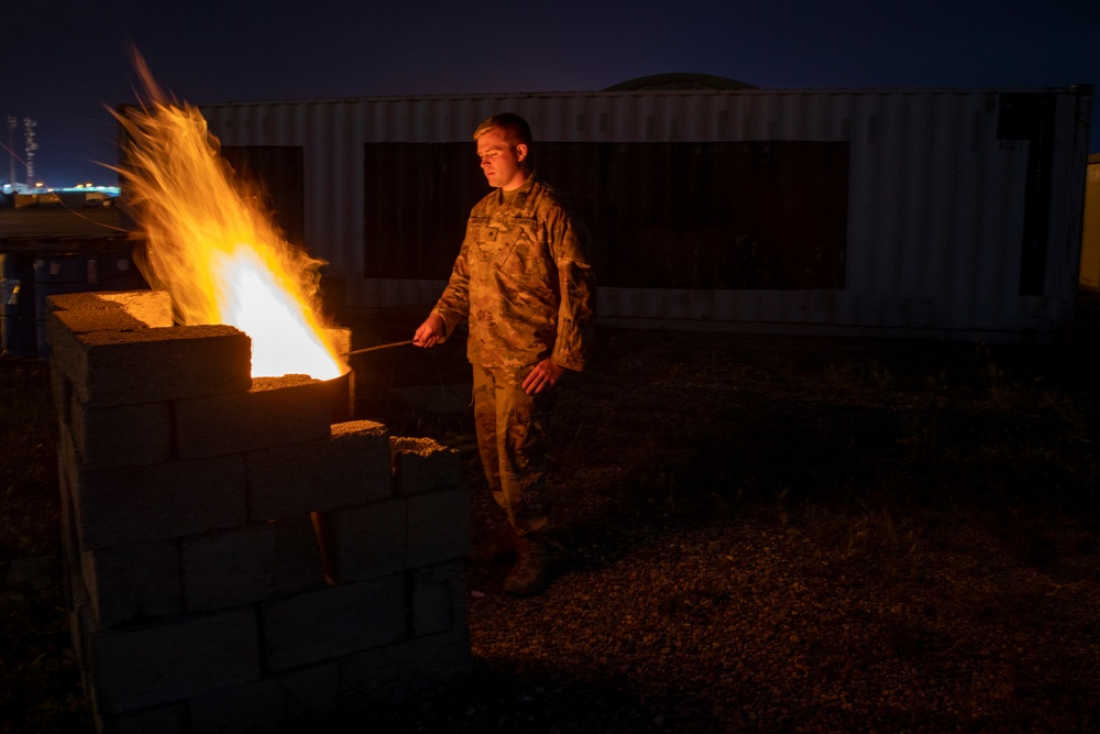 Soldier burns paper
