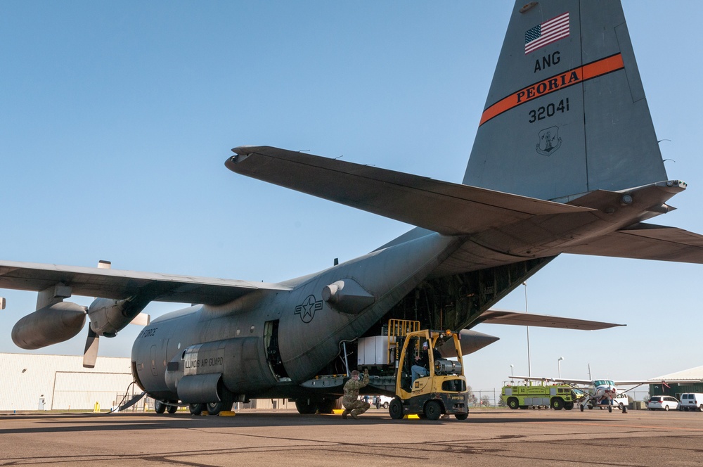 Illinois Air National Guard C-130s transport 250 medical isolation pods cross-country to combat COVID-19 in Chicago