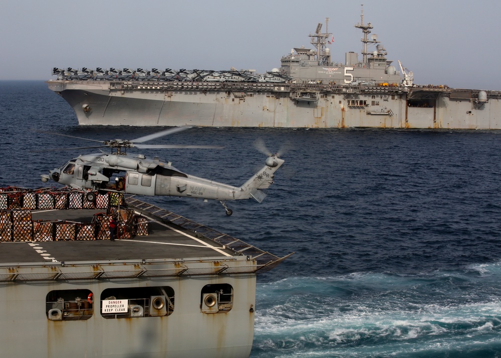 Marines participate in a replenishment-at-sea aboard the USS New York