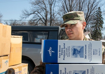 Iowa National Guard Couple Combats COVID-19