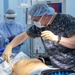 USNS Mercy Sailor Preps Patient