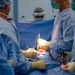 USNS Mercy Sailors Perform Surgery