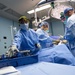 USNS Mercy Sailors Perform Surgery