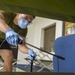 3rd Medical Battalion, 3rd Marine Logistics Group, sterilize a building in support of USS Theodore Roosevelt (CVN 71) Sailors