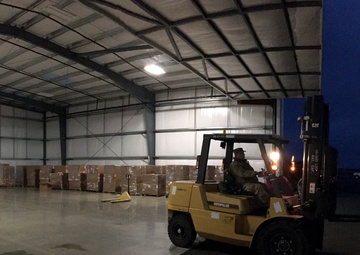 Volunteers and Military personnel work together to ship 500 ventilators to various states