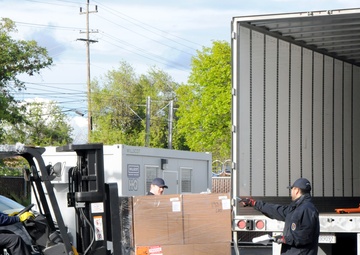 Volunteers and Military personnel work together to ship 500 ventilators to various states