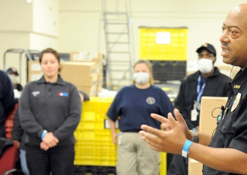 Volunteers and Military personnel work together to ship 500 ventilators to various states