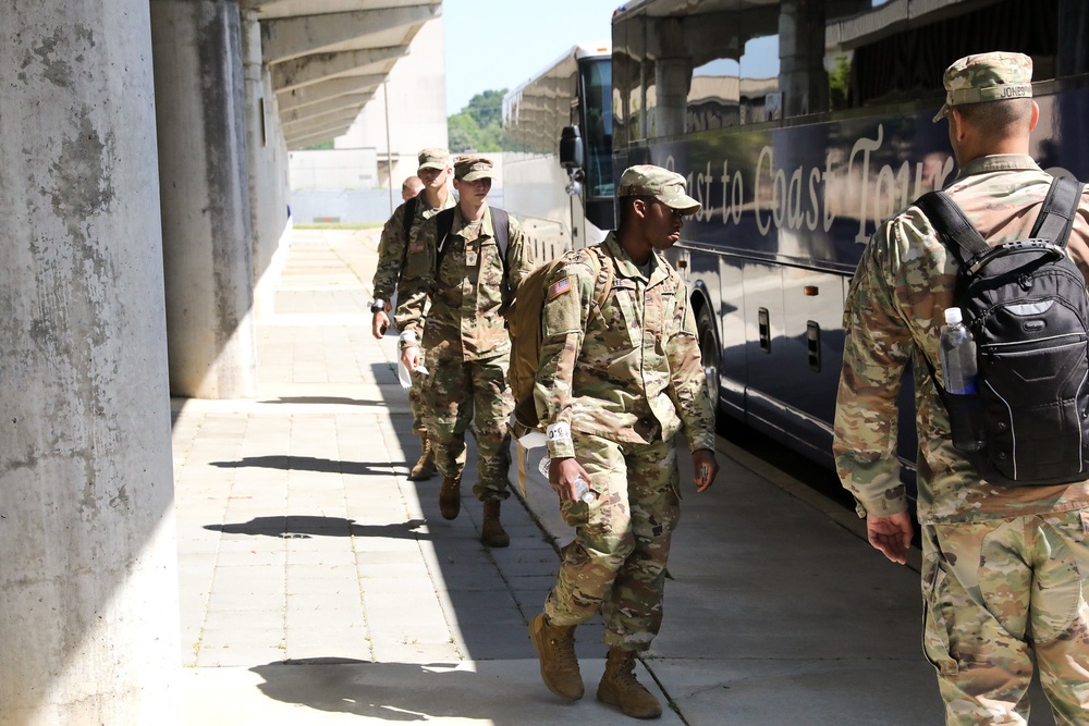 Newly-trained Soldiers depart Fort Benning amid elaborate health precautions