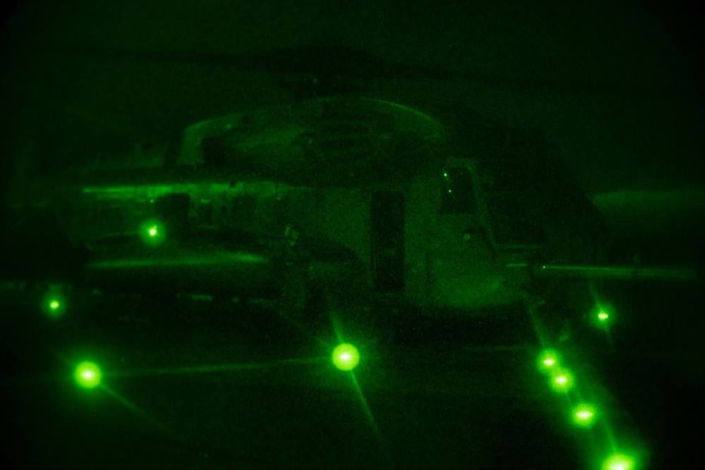 Marines with 31st MEU conduct nighttime flight operations aboard the USS America