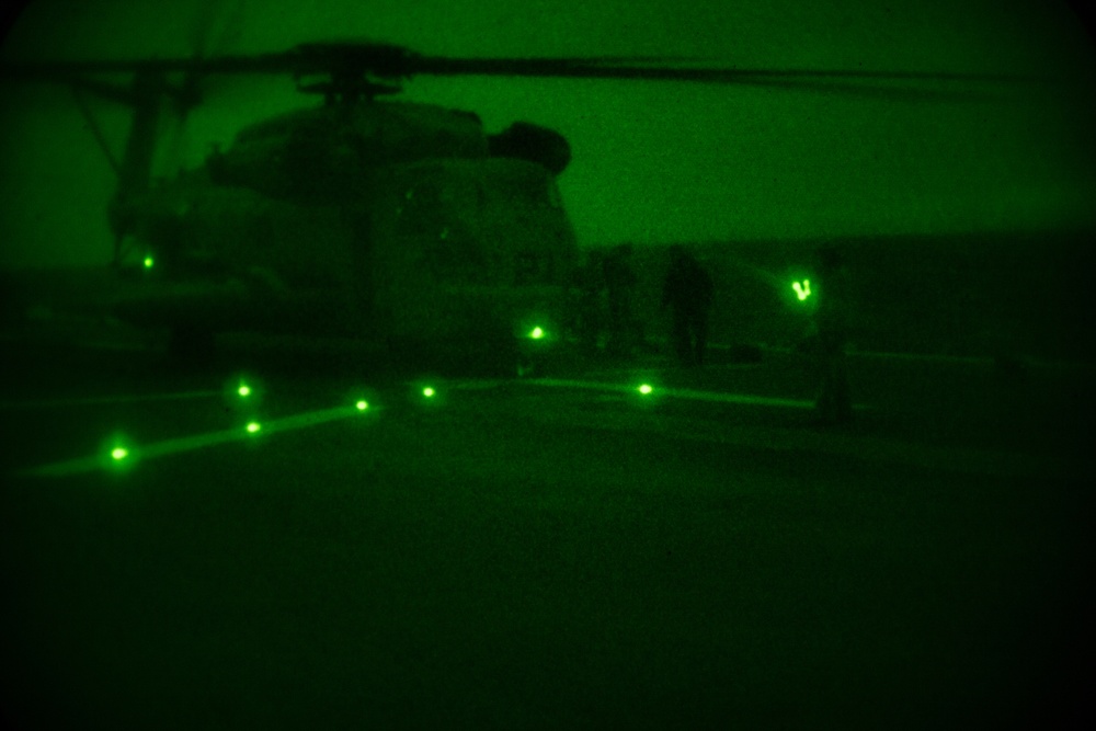 Marines with 31st MEU conduct nighttime flight operations aboard the USS America