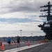 Nimitz Sailors Run On Flight Deck