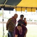 Na 'Ohana Papa O Mana Family Members Present Gifts During Ceremony