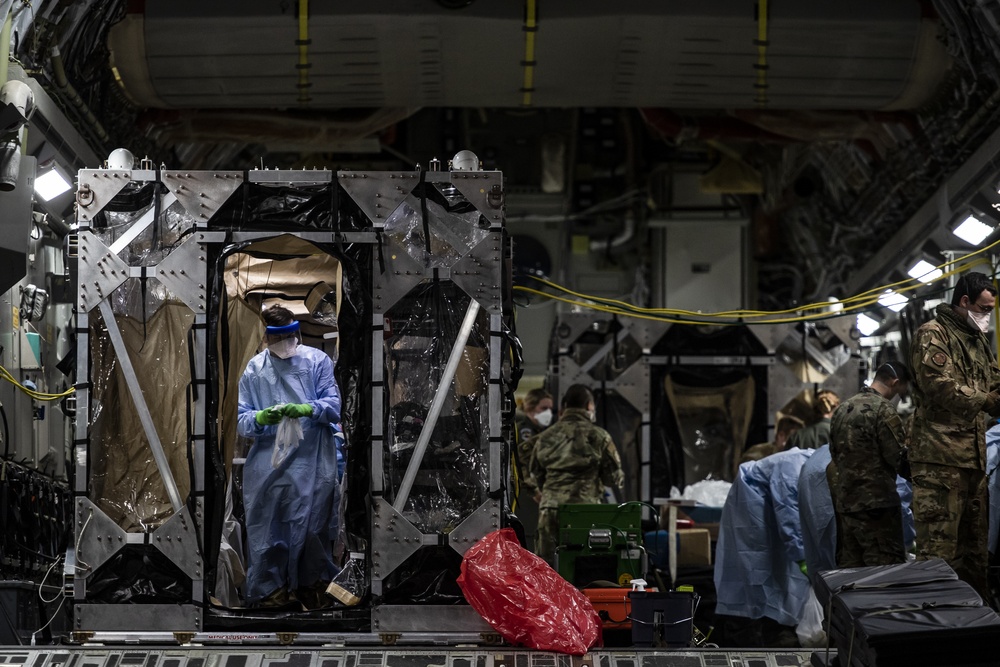 Mobility Airmen conduct historic first aeromedical evacuation mission using Transport Isolation System