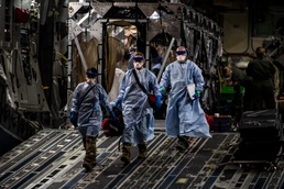 Mobility Airmen conduct historic first aeromedical evacuation mission using Transport Isolation System