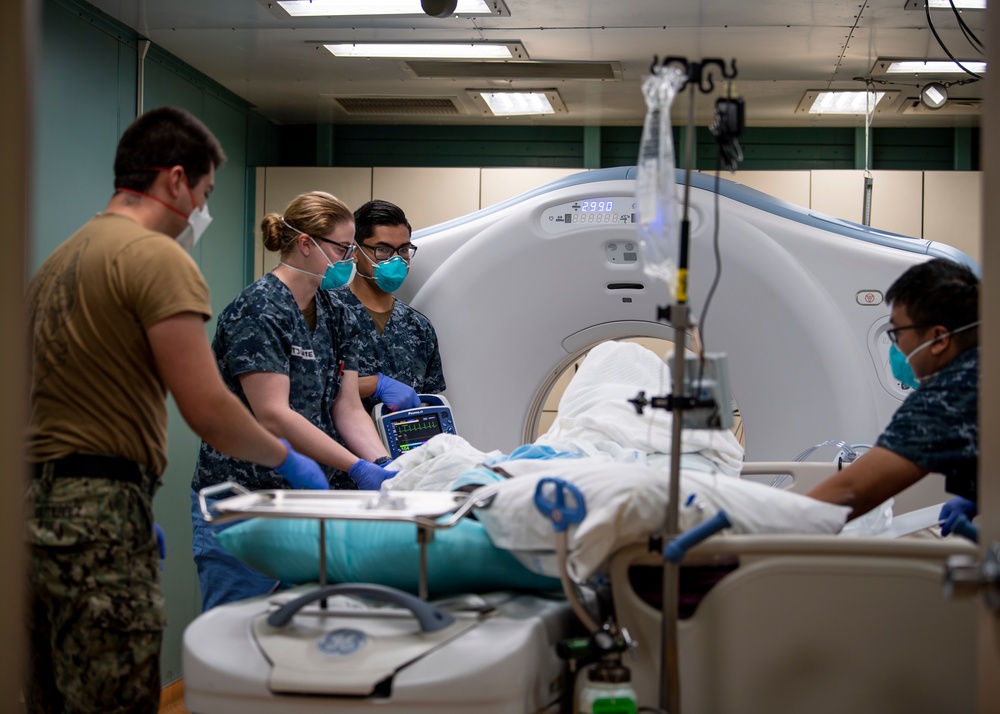 USNS Mercy Sailors Prep Patient