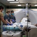 USNS Mercy Sailors Prep Patient