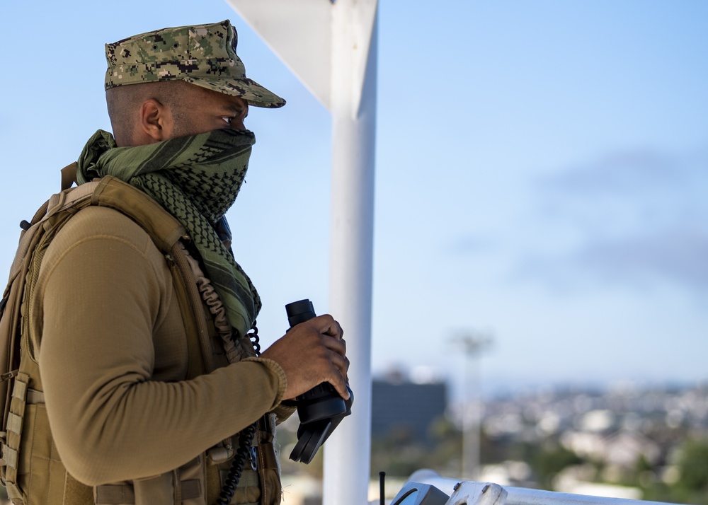 USNS Mercy Sailor Stands Watch