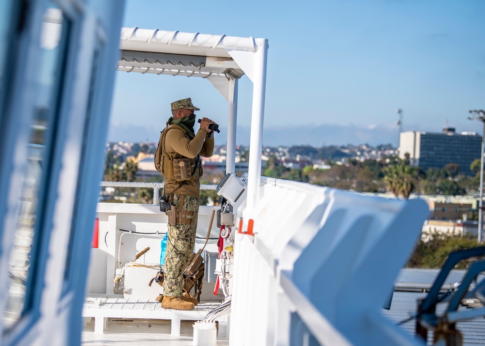 USNS Mercy Sailor Stands Watch