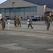 Members of the Massachusetts Army National Guard assist with medical screenings