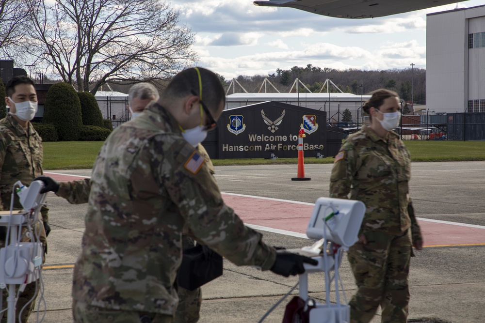 Massachusetts Army National Guard conducts medical screenings.