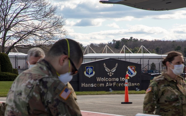 Massachusetts Army National Guard conducts medical screenings.