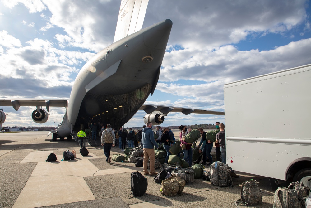 Members of The 801st Combat Support Hospital, U.S. Army Reserve, Fort Sheridan, Illinois, arrives in Hanscom Air Force Base