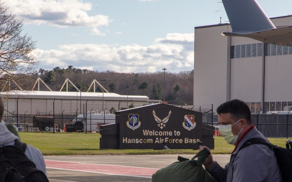 Members of The 801st Combat Support Hospital, U.S. Army Reserve, Fort Sheridan, Illinois, arrives in Hanscom Air Force Base