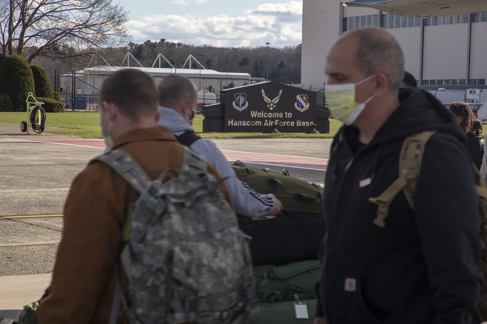 Members of The 801st Combat Support Hospital, U.S. Army Reserve, Fort Sheridan, Illinois, arrives in Hanscom Air Force Base