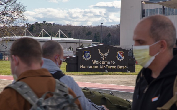 Members of The 801st Combat Support Hospital, U.S. Army Reserve, Fort Sheridan, Illinois, arrives in Hanscom Air Force Base