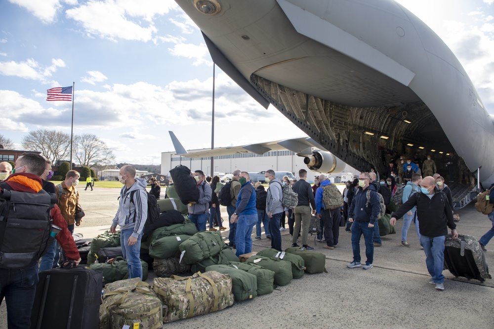 Members of The 801st Combat Support Hospital, U.S. Army Reserve, Fort Sheridan, Illinois, arrives in Hanscom Air Force Base