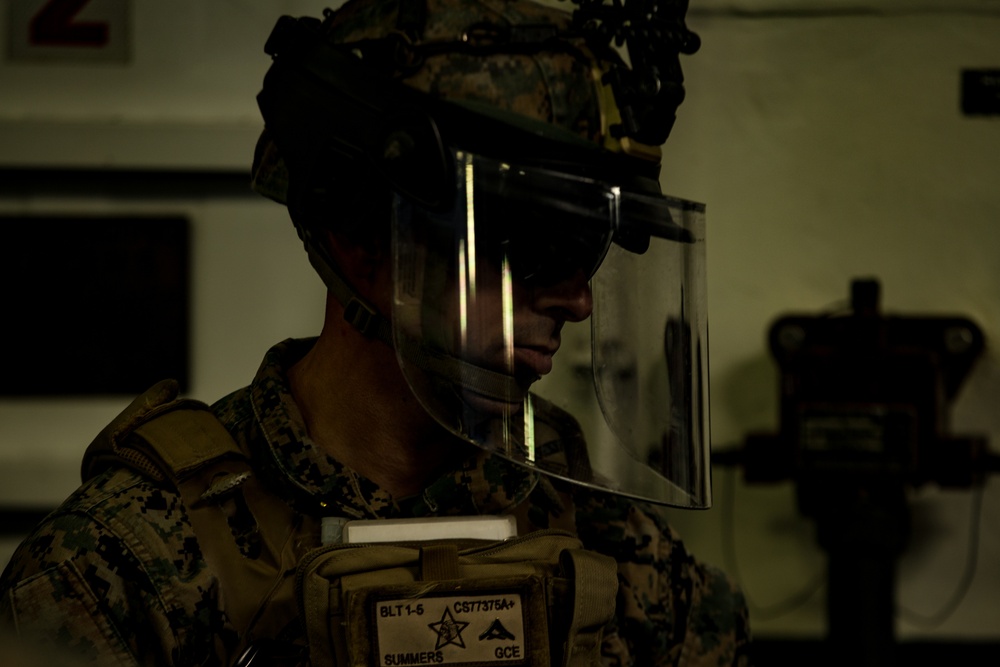 Hold the line: Marines practice riot control aboard USS America