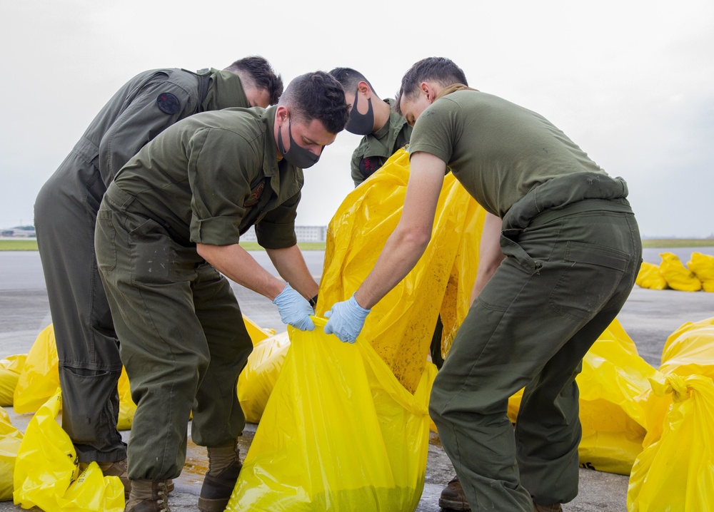 U.S. Marines assist with spill cleanup at Marine Corps Air Station Futenma