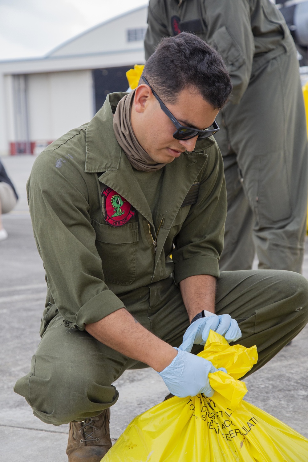 U.S. Marines assist with spill cleanup at Marine Corps Air Station Futenma