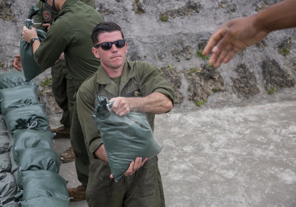 U.S. Marines assist with spill cleanup at Marine Corps Air Station Futenma