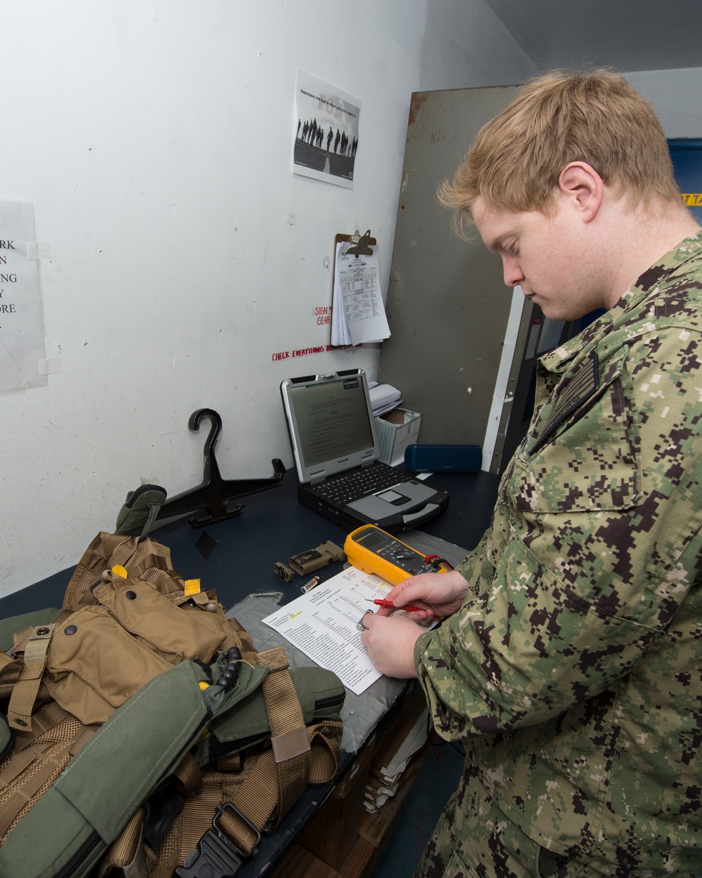 PR2 Spindler Inspects Aircrew Survival Gear