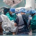 USNS Mercy Sailors Treat Patient