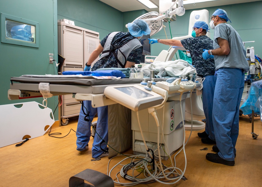 USNS Mercy Sailors Treat Patient