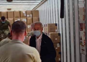Arkansas National Guardsmen unload trailers with PPE for Arkansas counties