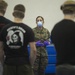 US Sailors with 3rd Medical Bn screen USS Theodore Roosevelt Sailors for COVID-19 symptoms