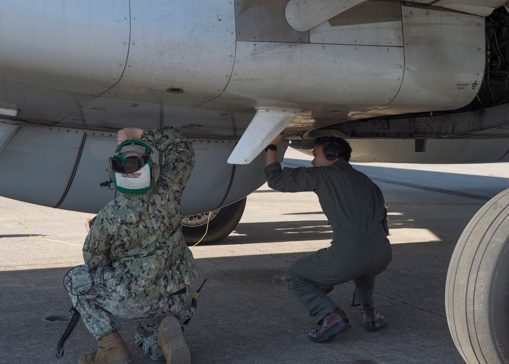 VP-4 Sailors Perform Preflight Inspection