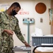 USNS Mercy Sailor Organizes a Medical Supply Drawer