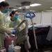 Sailors Monitor Patient