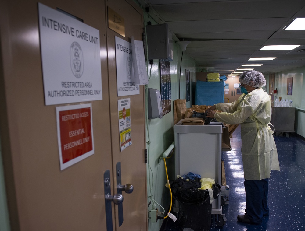 USNS Comfort Medical Personnel Treat Critical Care Patients