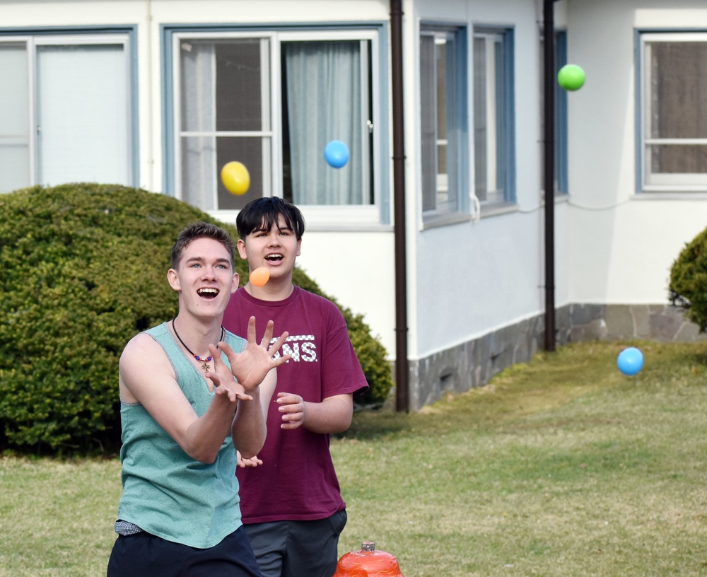 Camp Zama Easter Egg Sling models fun, safe behavior