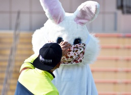 Camp Zama Easter Egg Sling models fun, safe behavior