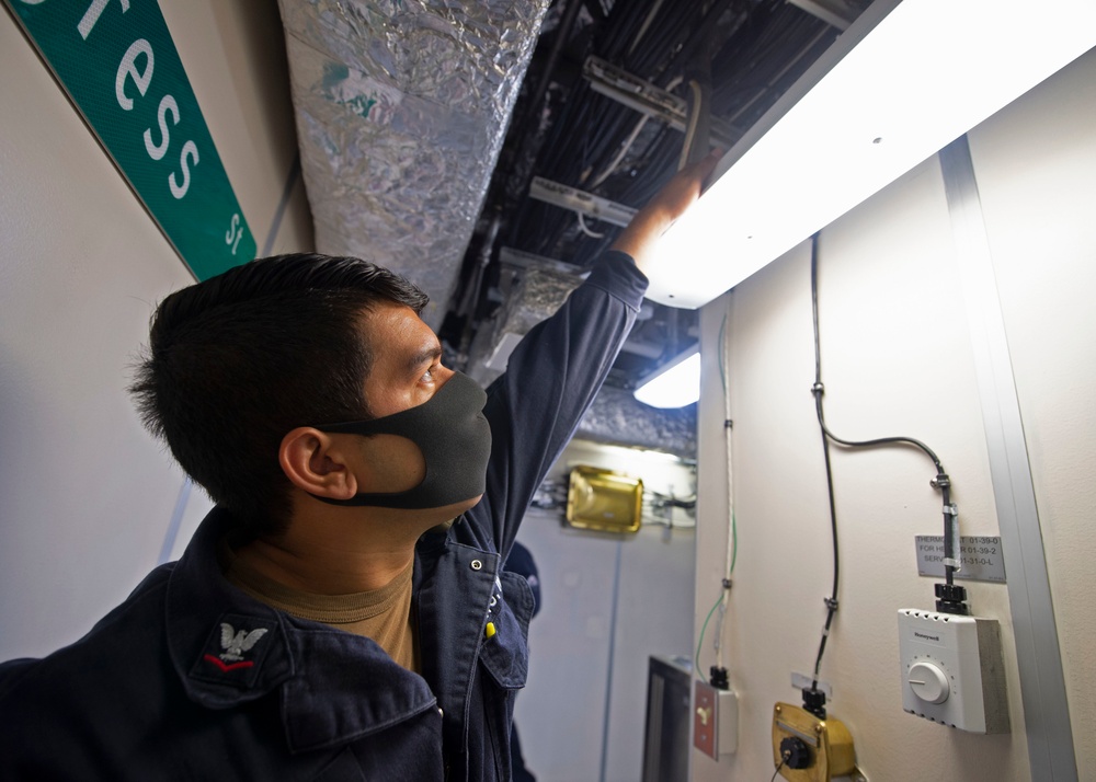 Sailors Sanitize USS Gabrielle Giffords