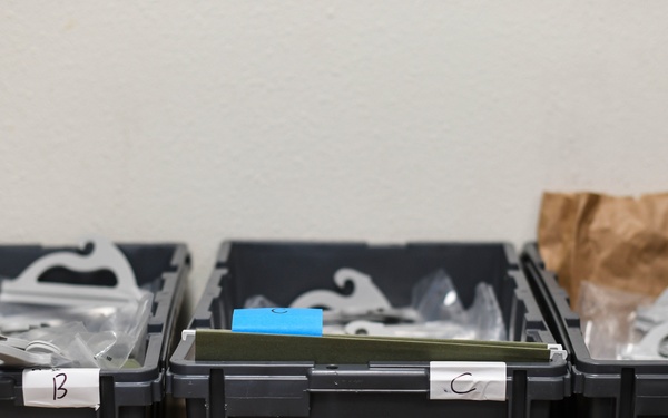 Cannon Airmen volunteer in helping families w/ medication drop off point