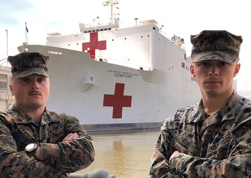 Marines conducting security help save patients bound for USNS Comfort