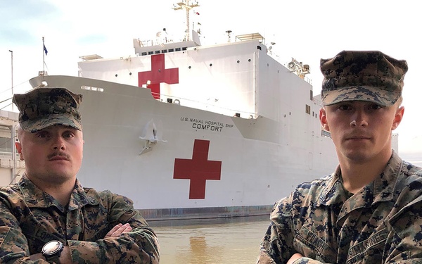 Marines conducting security help save patients bound for USNS Comfort