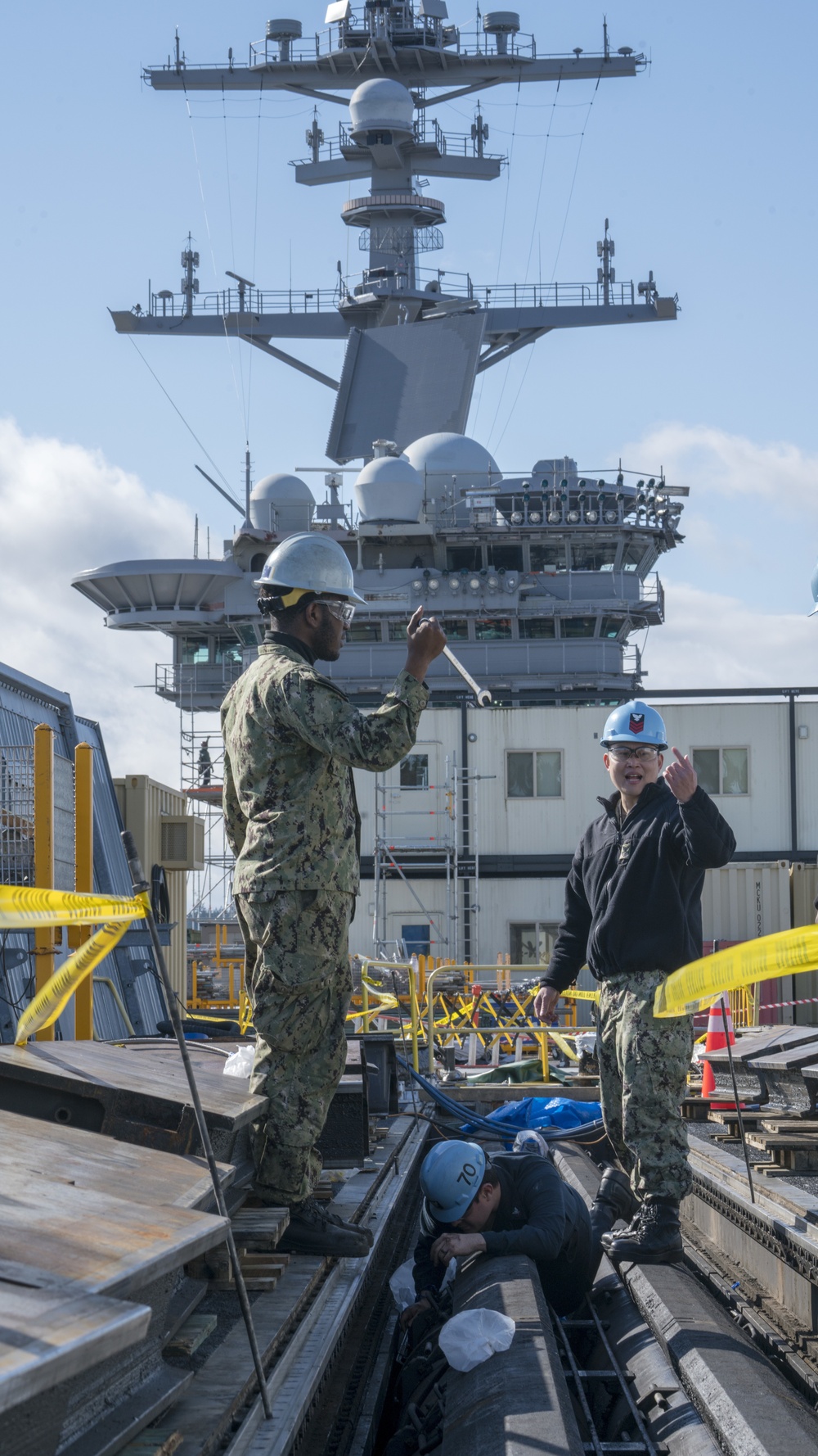 USS Carl Vinson Sailors Work on Aircraft Catapult